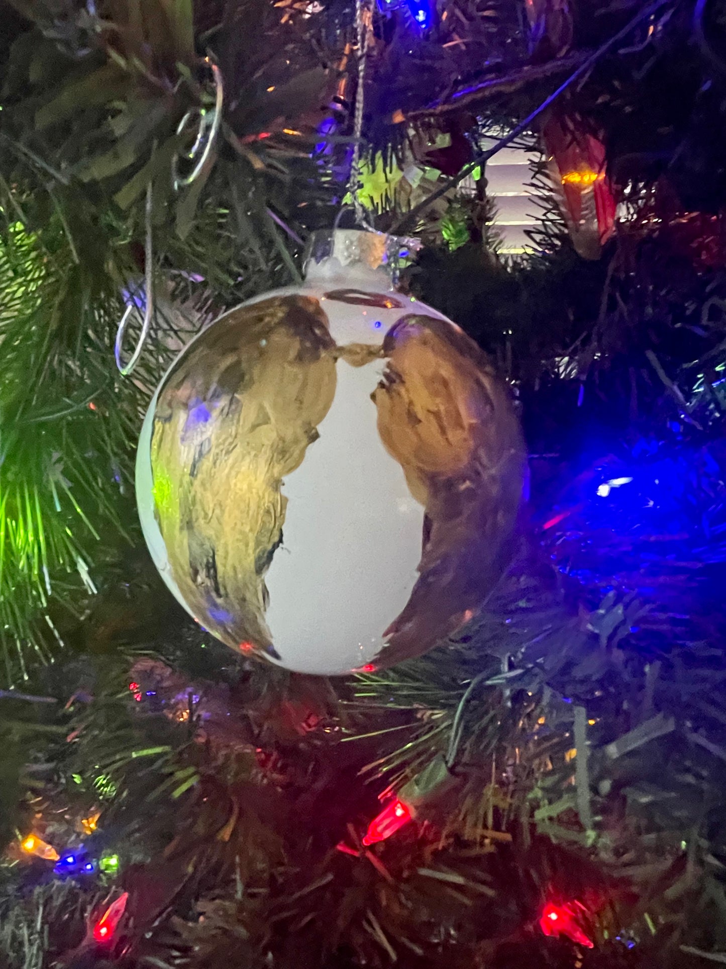 Hand-painted glass Christmas ornament by Tracee Gentry Matthews