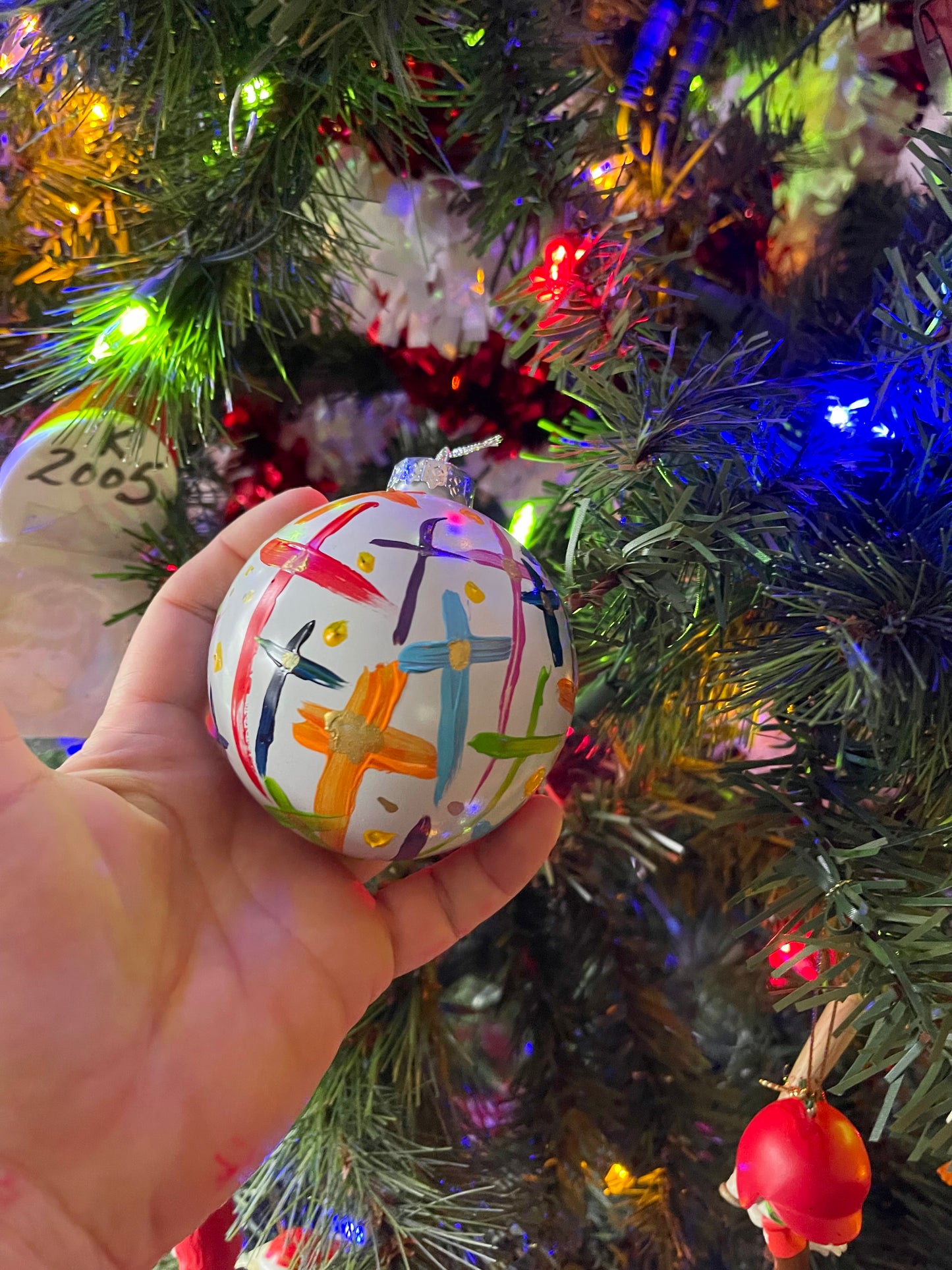 Hand-painted glass Christmas ornament by Tracee Gentry Matthews