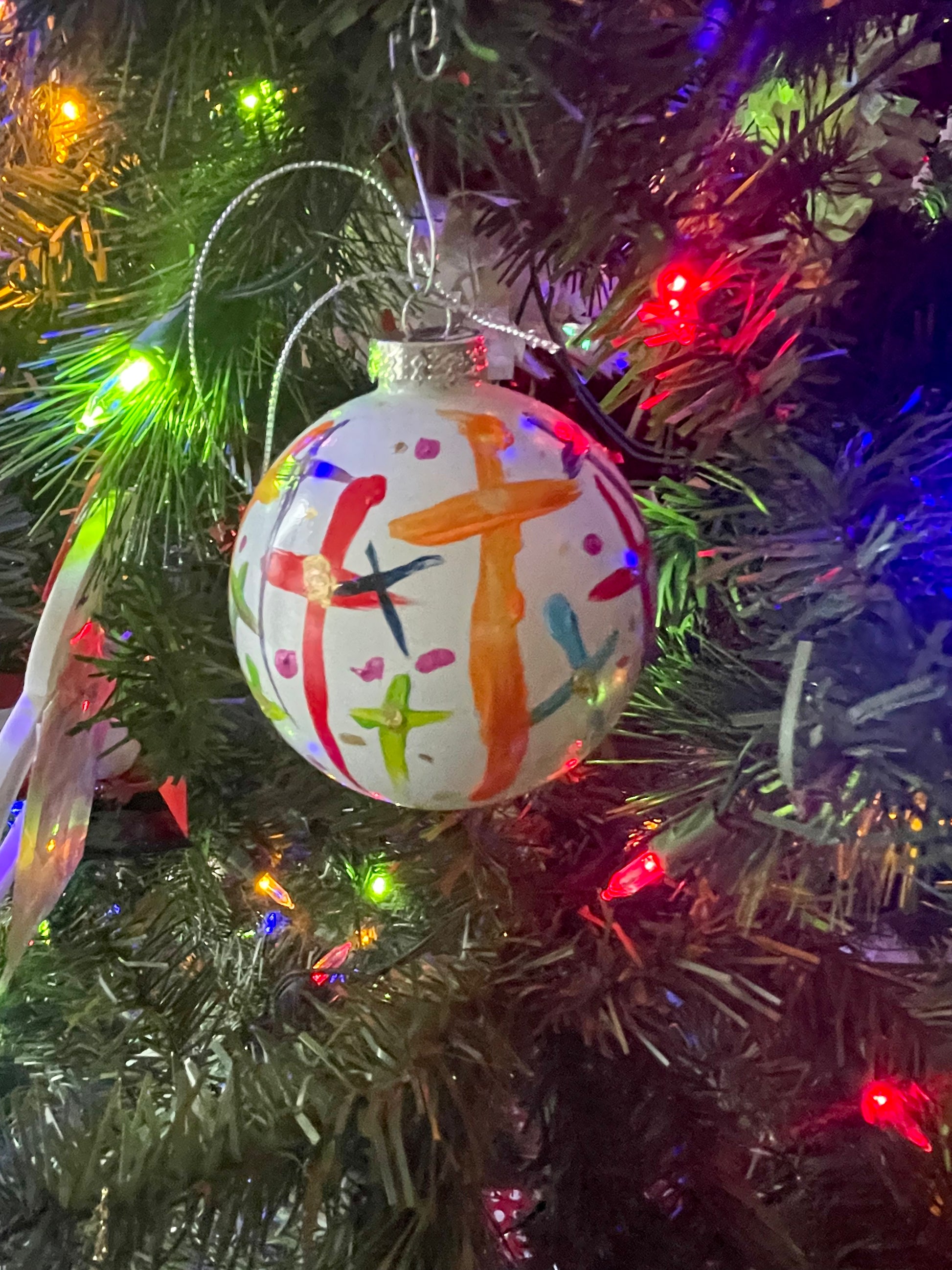 Hand-painted glass Christmas ornament by Tracee Gentry Matthews